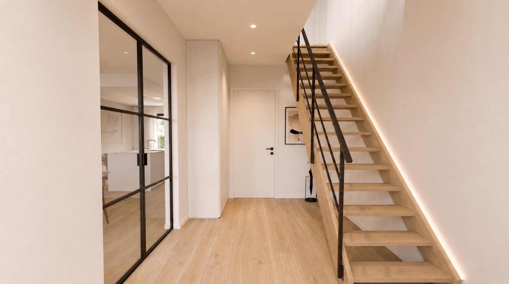 Entrance hall with oak stairs, steel-framed glass door and cove lighting